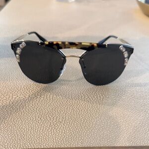 Prada Stylish  Sunglasses with Tortoise Accents